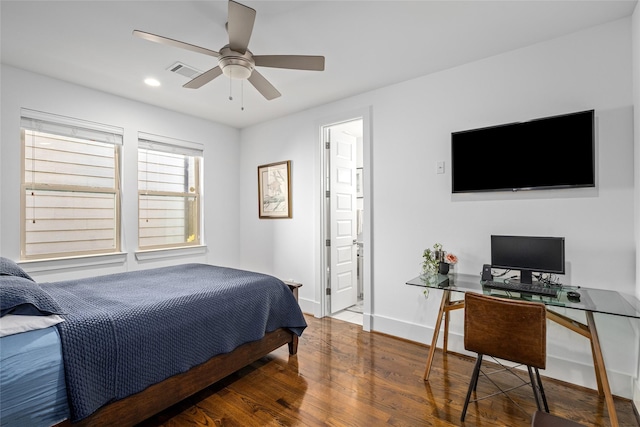 bedroom featuring visible vents, wood finished floors, baseboards, ensuite bathroom, and recessed lighting