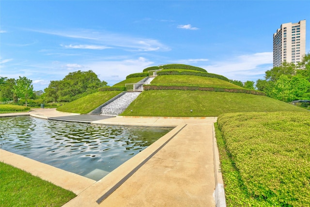 surrounding community featuring a lawn
