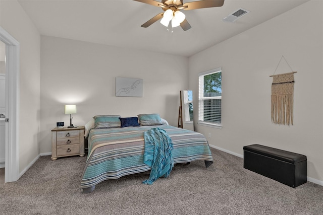 carpeted bedroom with baseboards, ceiling fan, and visible vents