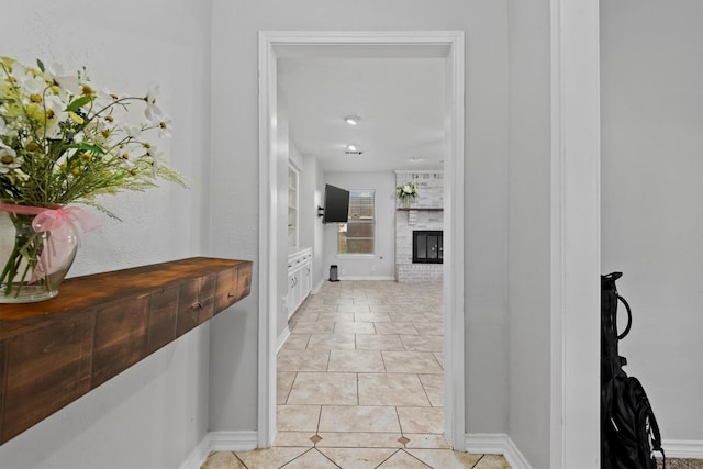 227 Oak Hollow St, Conroe, TX 77301 - corridor with light tile patterned floors, baseboards, and built in features
