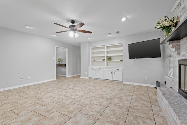 227 Oak Hollow St, Conroe, TX 77301 - unfurnished living room with built in features, a fireplace, baseboards, ceiling fan, and light tile patterned floors