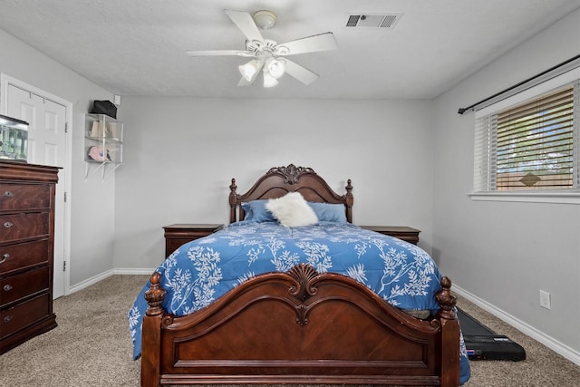 227 Oak Hollow St, Conroe, TX 77301 - carpeted bedroom featuring baseboards, ceiling fan, and visible vents