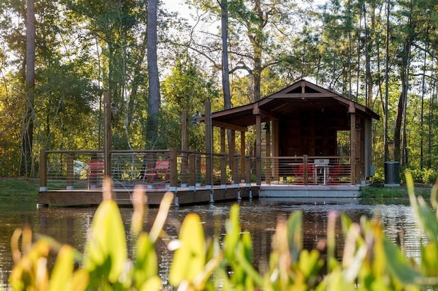 view of community with a water view