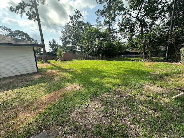view of yard featuring fence