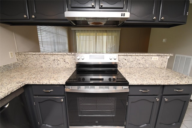 kitchen featuring light countertops, under cabinet range hood, stainless steel electric range, and visible vents