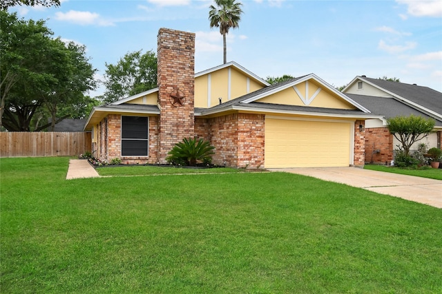 view of front facade featuring a front lawn, fence, a chimney, an attached garage, and driveway