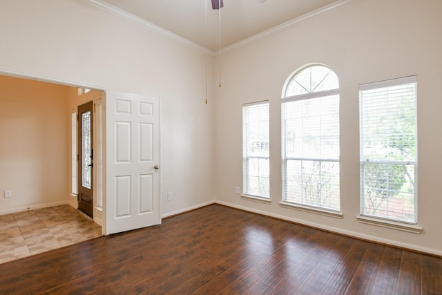 2318 Appian Way, Pearland, TX 77584 - empty room featuring baseboards, ornamental molding, wood-type flooring, and ceiling fan