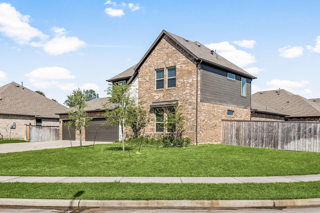 31214 Gullwing Manor Dr, Tomball, TX 77375 - view of home's exterior featuring brick siding, a lawn, fence, and driveway