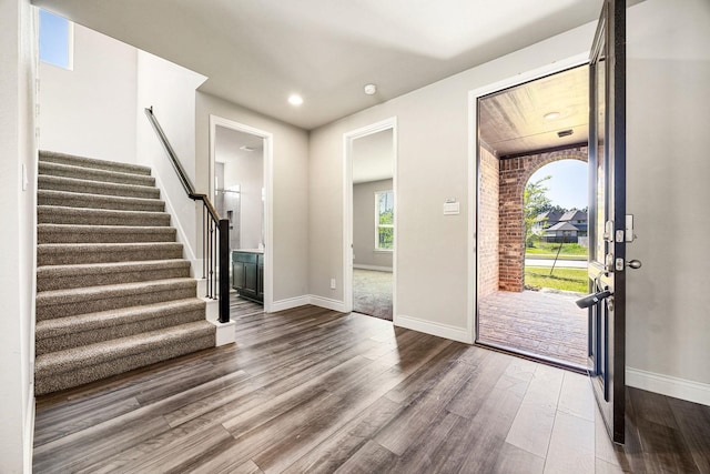 31214 Gullwing Manor Dr, Tomball, TX 77375 - foyer with recessed lighting, baseboards, stairs, and dark wood-type flooring