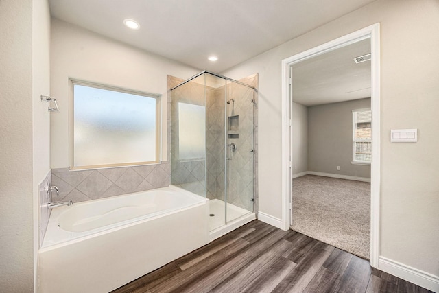 31214 Gullwing Manor Dr, Tomball, TX 77375 - bathroom with a healthy amount of sunlight, a shower stall, and visible vents
