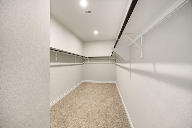 31214 Gullwing Manor Dr, Tomball, TX 77375 - walk in closet featuring carpet flooring and visible vents