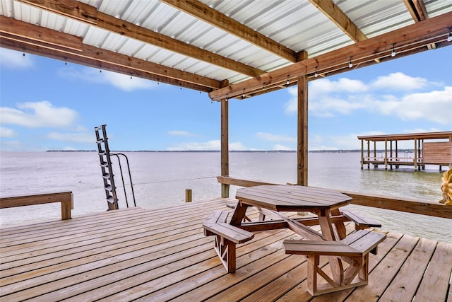 dock area with a water view