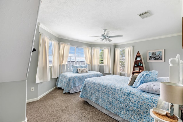 bedroom with a ceiling fan, visible vents, crown molding, baseboards, and carpet