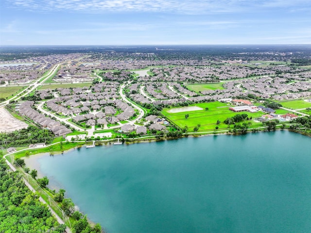 aerial view with a water view and a residential view