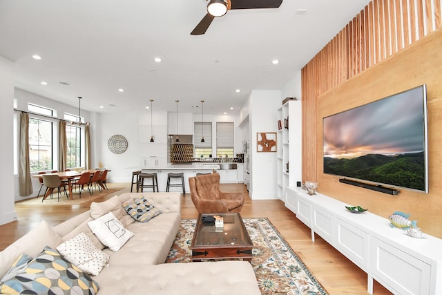 2303 Yupon St, Houston, TX 77006 - living room featuring recessed lighting, a ceiling fan, light wood-style flooring, and baseboards