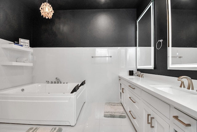 2303 Yupon St, Houston, TX 77006 - bathroom with a sink, tile patterned flooring, double vanity, and a bath