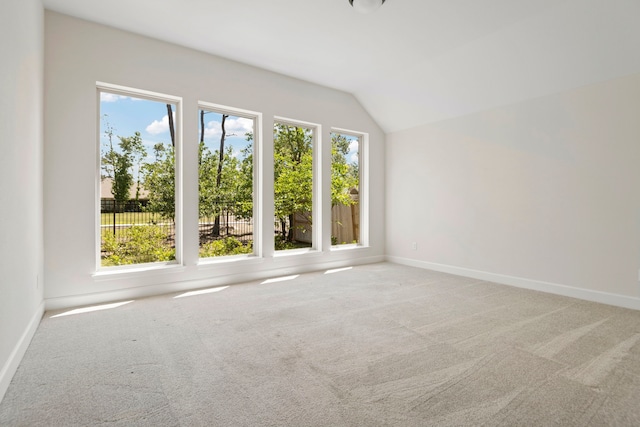 21873 Otter Point Ln, Porter, TX 77365 - interior space featuring carpet floors, baseboards, and vaulted ceiling