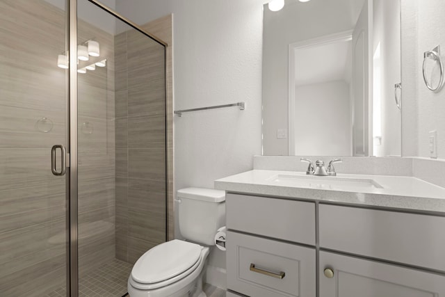 21873 Otter Point Ln, Porter, TX 77365 - full bath featuring toilet, a textured wall, a shower stall, and vanity