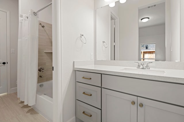 21873 Otter Point Ln, Porter, TX 77365 - bathroom with visible vents, shower / bath combo, vanity, baseboards, and tile patterned floors
