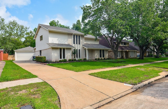 2814 River Birch Dr, Sugar Land, TX 77479 - view of front facade featuring a garage, fence, a front yard, and brick siding