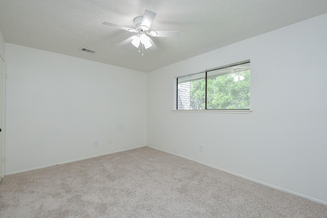 2814 River Birch Dr, Sugar Land, TX 77479 - carpeted spare room with visible vents, a ceiling fan, baseboards, and a textured ceiling