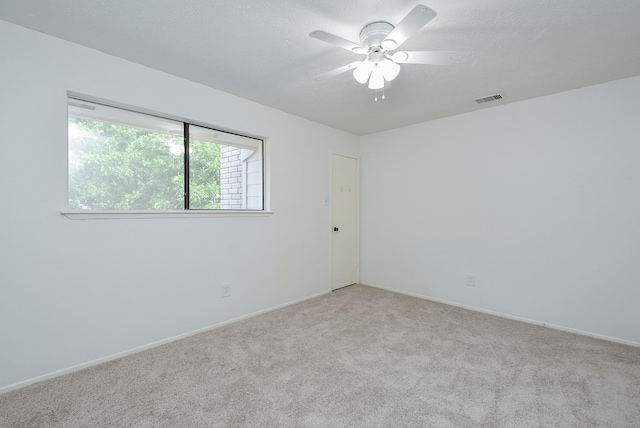 2814 River Birch Dr, Sugar Land, TX 77479 - spare room with carpet flooring, a ceiling fan, baseboards, and visible vents