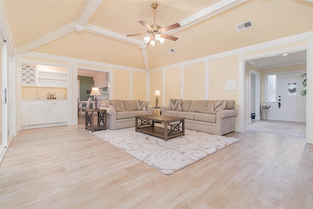 living room featuring light wood-style floors, high vaulted ceiling, a ceiling fan, and visible vents