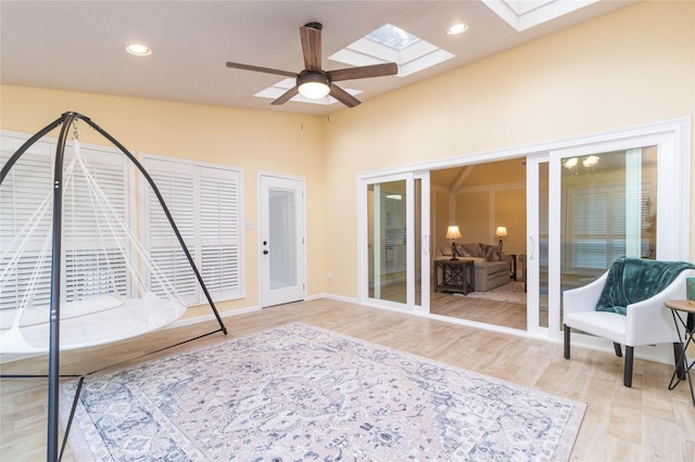 sunroom / solarium featuring a skylight
