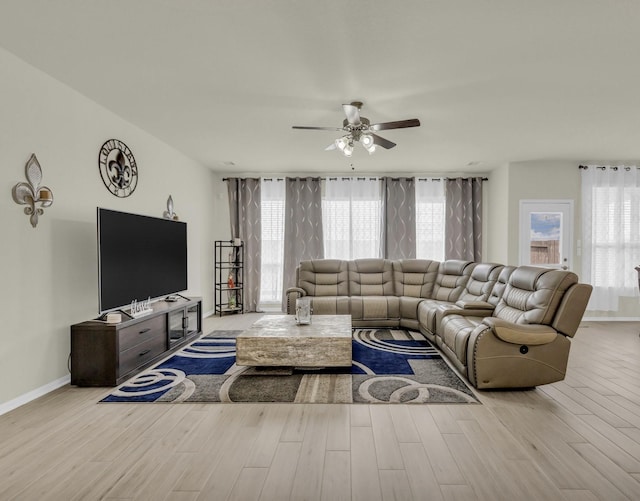 23134 Quiet Heron Ct, Katy, TX 77493 - living area with ceiling fan, wood finished floors, and baseboards