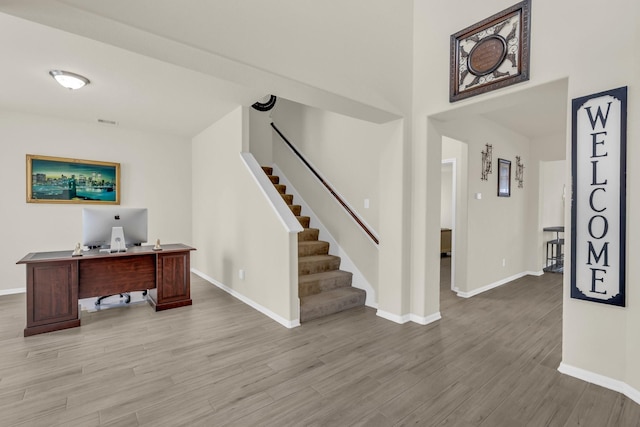 23134 Quiet Heron Ct, Katy, TX 77493 - unfurnished office with baseboards and light wood finished floors