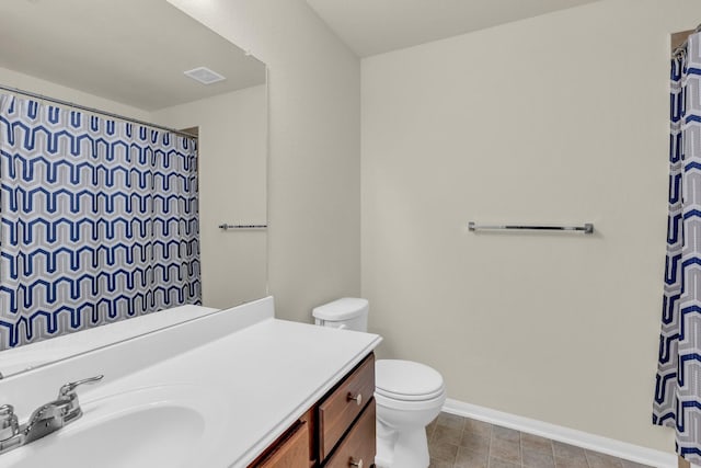 23134 Quiet Heron Ct, Katy, TX 77493 - bathroom with toilet, baseboards, vanity, and a shower with shower curtain