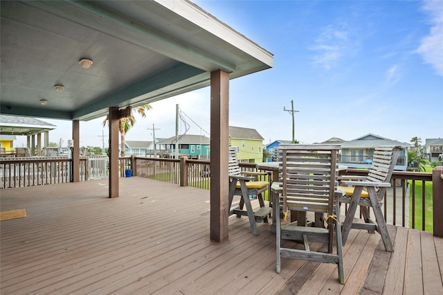 wooden deck featuring a residential view