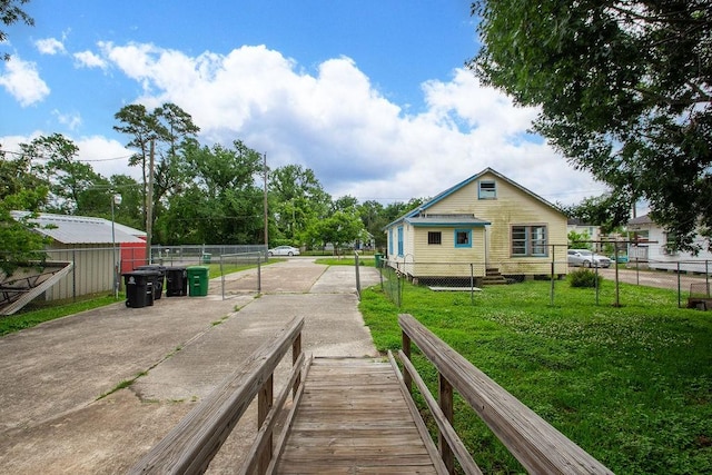 1817 Mcdaniel St, Houston, TX 77093 - rear view of house with fence and a yard
