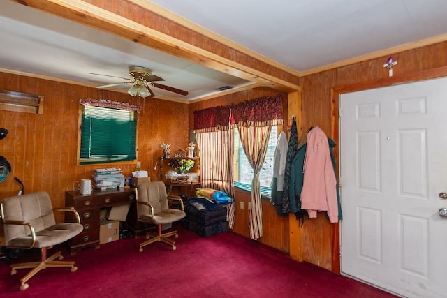 1817 Mcdaniel St, Houston, TX 77093 - sitting room featuring carpet flooring, crown molding, wood walls, a ceiling fan, and visible vents