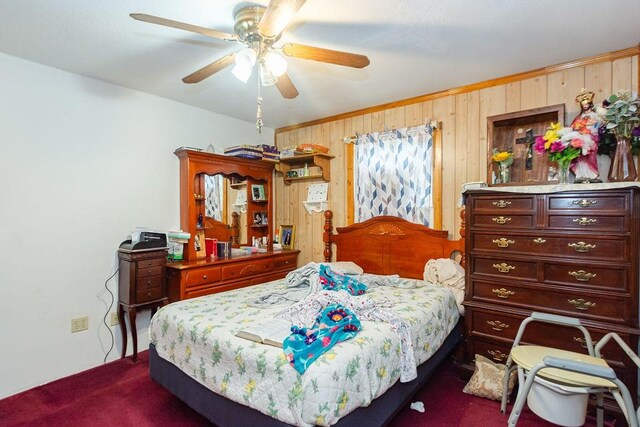 1817 Mcdaniel St, Houston, TX 77093 - bedroom with wooden walls, ceiling fan, and dark carpet
