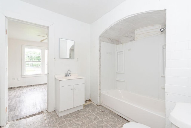 1817 Mcdaniel St, Houston, TX 77093 - full bath with vanity, shower / bathing tub combination, tile patterned floors, and toilet
