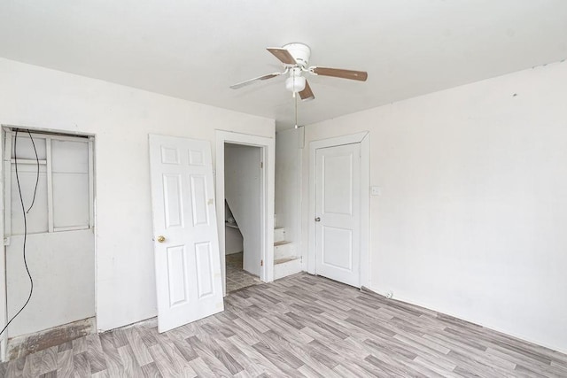 1817 Mcdaniel St, Houston, TX 77093 - unfurnished bedroom featuring a ceiling fan and light wood finished floors