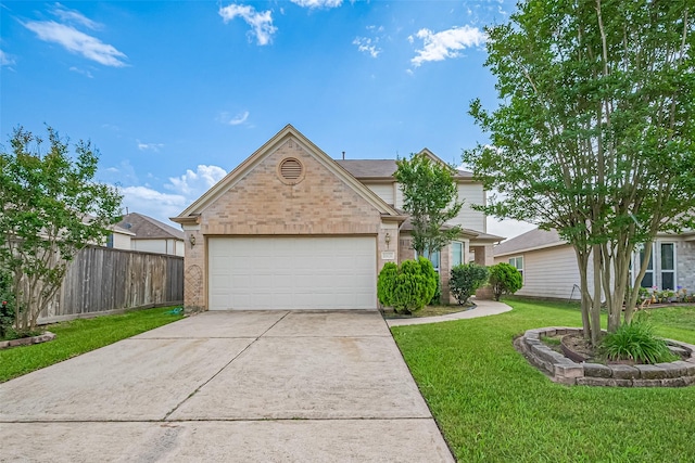 traditional home featuring driveway, a front yard, brick siding, fence, and an attached garage