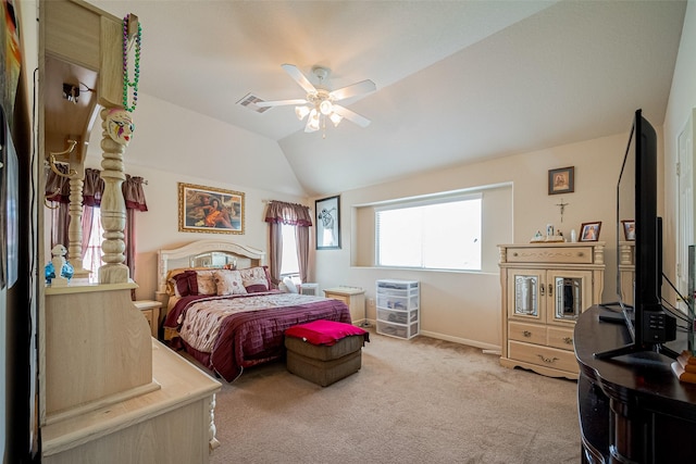 bedroom featuring visible vents, baseboards, ceiling fan, carpet flooring, and vaulted ceiling