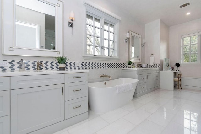 5262 Huckleberry Ln, Houston, TX 77056 - bathroom with a freestanding tub and vanity