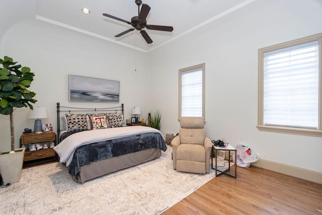 bedroom featuring baseboards, a ceiling fan, recessed lighting, and wood finished floors