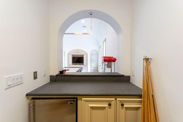 hall featuring arched walkways