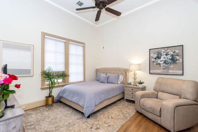 5262 Huckleberry Ln, Houston, TX 77056 - bedroom with wood finished floors and ceiling fan