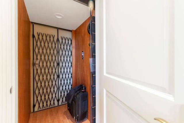 room details with elevator and wood finished floors