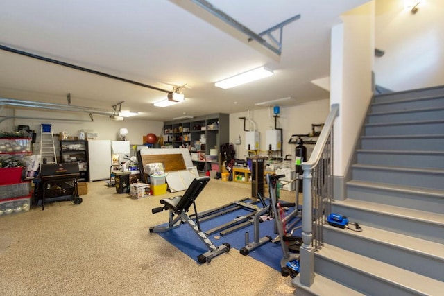 5262 Huckleberry Ln, Houston, TX 77056 - exercise room with a garage, carpet floors, and water heater