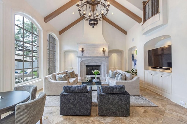 5262 Huckleberry Ln, Houston, TX 77056 - living room featuring high vaulted ceiling, a chandelier, beamed ceiling, a fireplace, and arched walkways