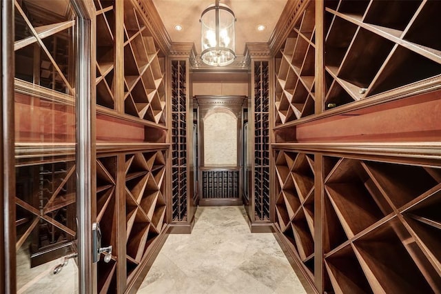 5262 Huckleberry Ln, Houston, TX 77056 - wine room featuring a chandelier and recessed lighting
