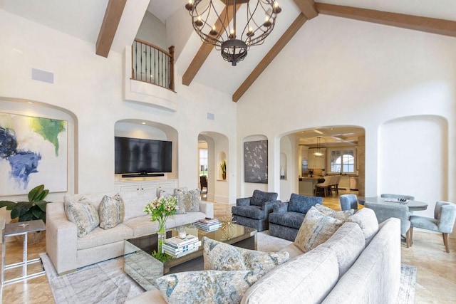 living room featuring visible vents, arched walkways, high vaulted ceiling, beamed ceiling, and a chandelier