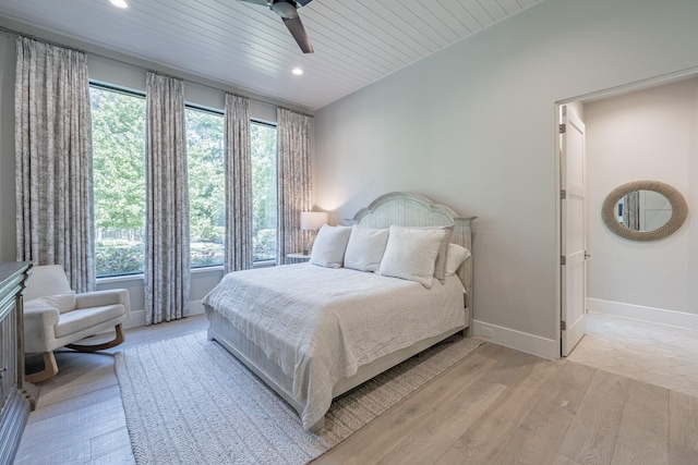 bedroom with recessed lighting, baseboards, a ceiling fan, and light wood-type flooring