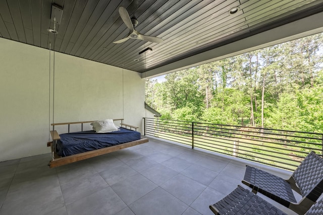 view of patio featuring ceiling fan